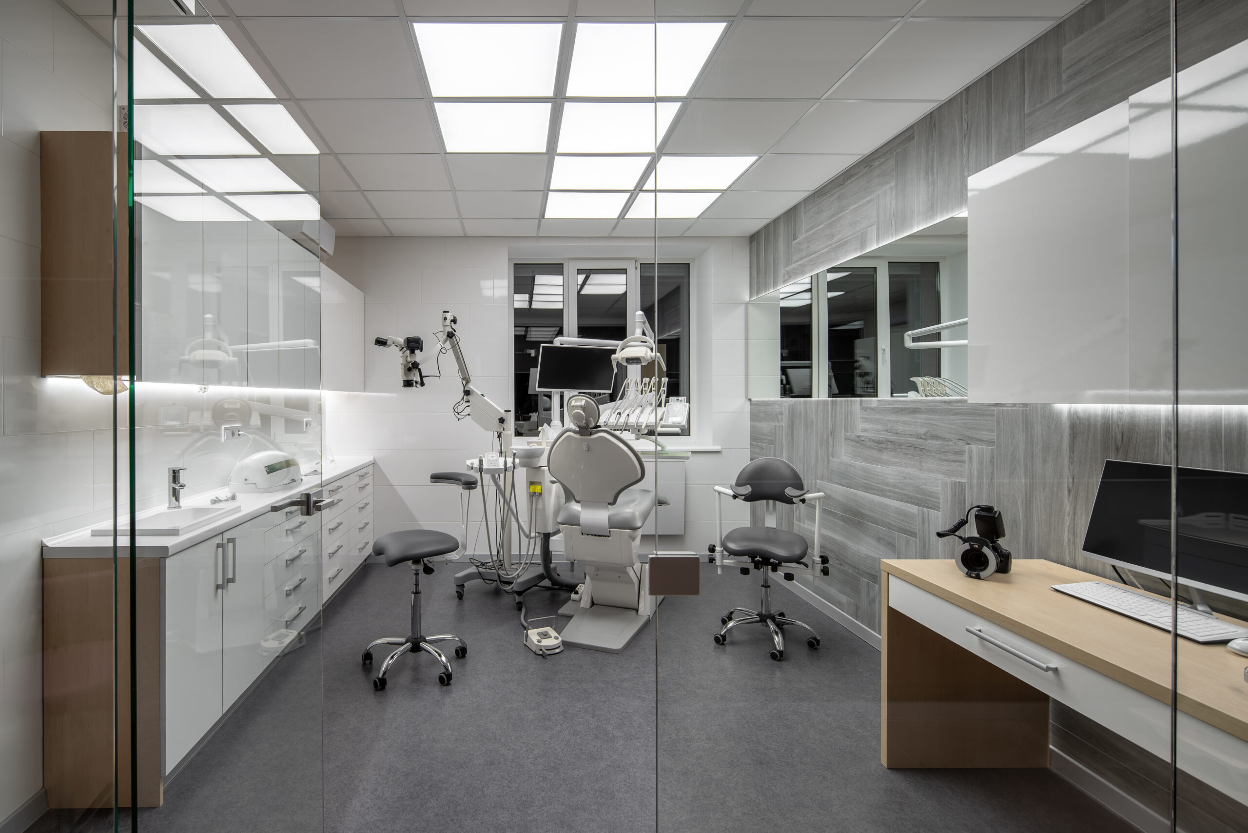 Modern pediatric dental office interior with digital x-ray equipment
